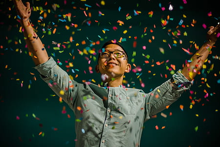 man throwing confetti's thumbnail