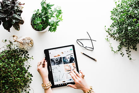 person using tablet computer thumbnail