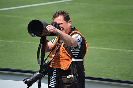 person shooting while using a camera thumbnail