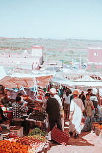 people at the market during daytime thumbnail