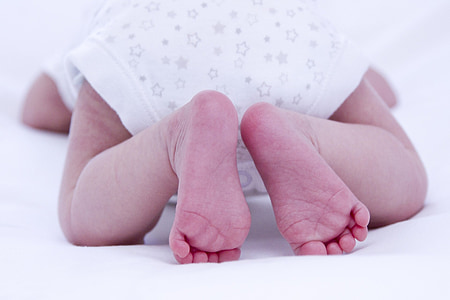baby on bed thumbnail