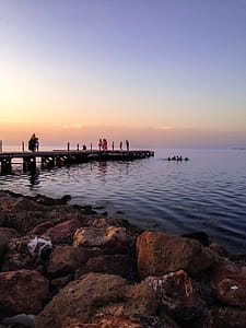 People Walking On Wooden Dock thumbnail
