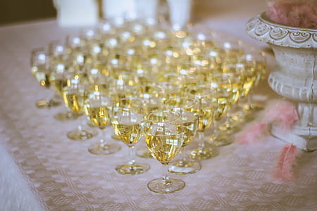 tilt shift lens photography of clear wine glass lot thumbnail
