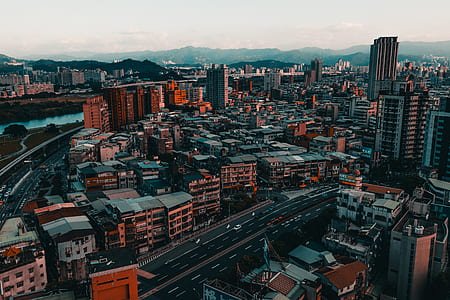 aerial photo of brown-and-black cityscape at daytime thumbnail
