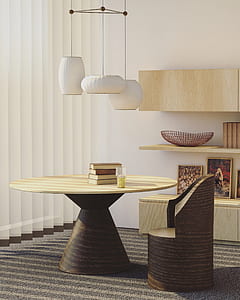 round beige wooden table with chair under white pendant lamp thumbnail