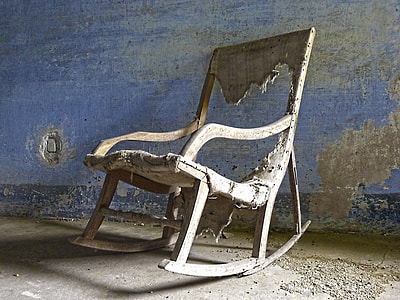 brown wooden rocking armchair thumbnail