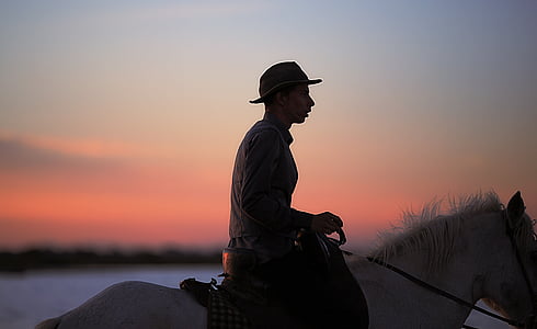 man riding a horse thumbnail