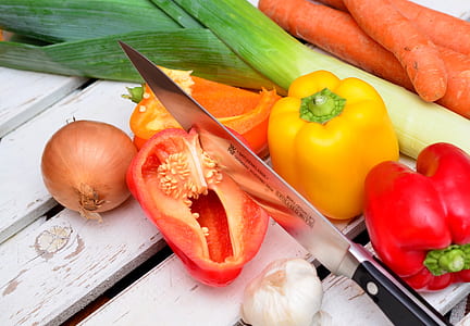 black and gray steel knife and assorted vegetables thumbnail
