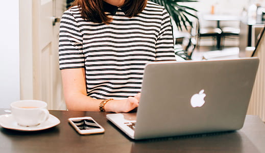 woman using silver MacBook thumbnail