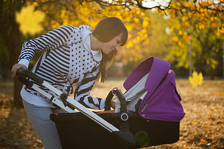 Photo of a Woman Looking Her Baby thumbnail