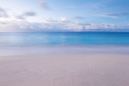 silent beach on a cloudy day photo thumbnail