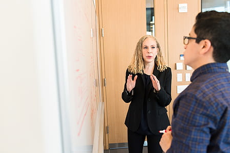 Woman Standing Near Whiteboard thumbnail