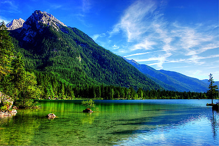body of water near mountain thumbnail