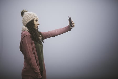 woman taking selfie thumbnail