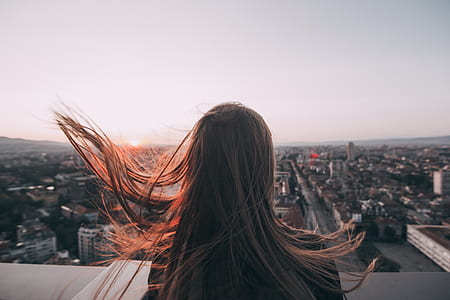 woman at top of building thumbnail