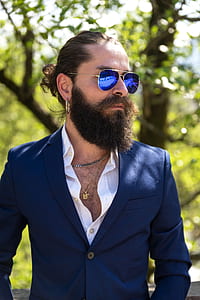 man wearing blue formal suit thumbnail