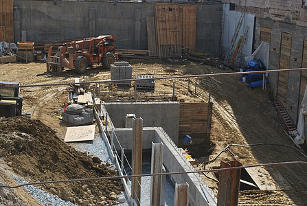 brown heavy equipment on construction site thumbnail