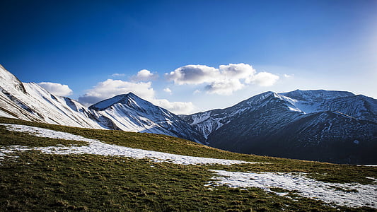 mountain under blue sky thumbnail