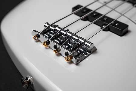 white electric bass guitar thumbnail