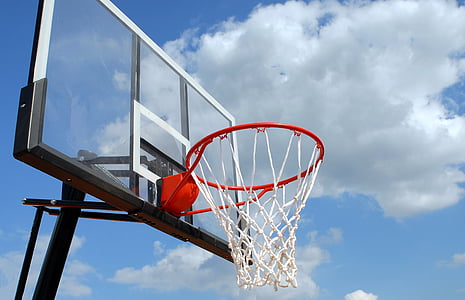 blue and white basketball system overlooking the white clouds thumbnail