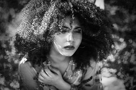 grayscale photography of woman looking down thumbnail