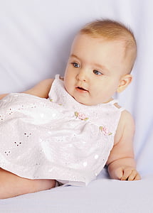 baby lying on bed thumbnail