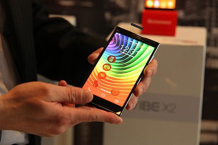 person showing black smartphone thumbnail
