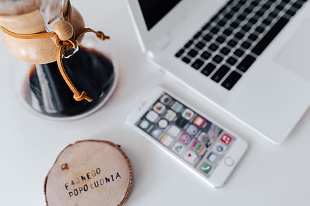 Workplace with laptop on table at home thumbnail