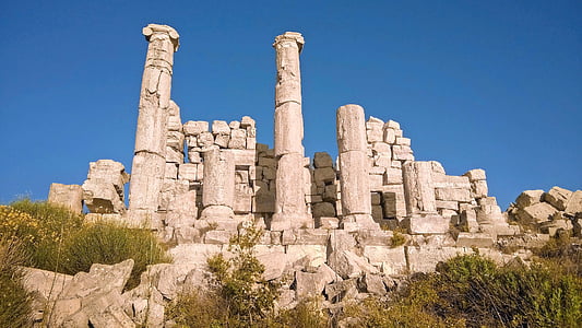 rock formation under clear blue sky thumbnail