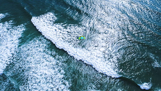 aerial photography of ocean waves thumbnail