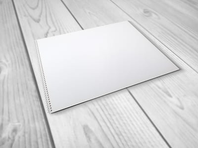 spiral notepad placed on gray surfacer thumbnail