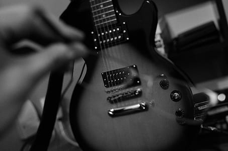 grayscale photo of electric guitar thumbnail