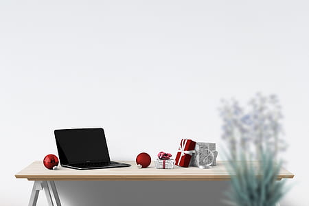 black laptop on top of table thumbnail