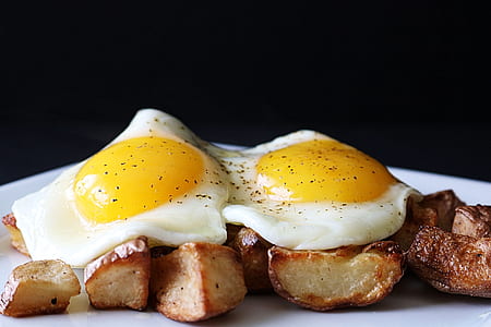 selective focus photo of grilled meat and sunny side up egg on top thumbnail