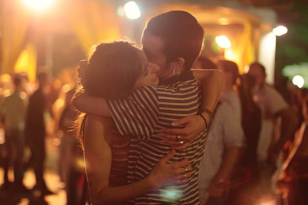 man and woman hugging during nighttime thumbnail