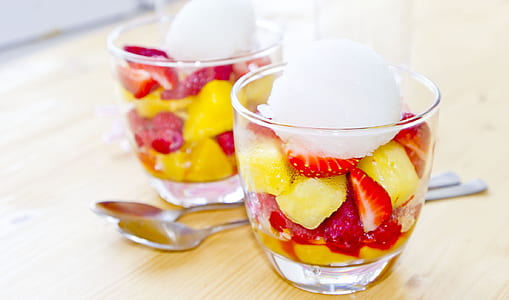 strawberries and pineapples on two glass cups thumbnail