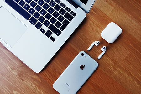 silver iPhone 7, AirPods, and MacBook Air thumbnail