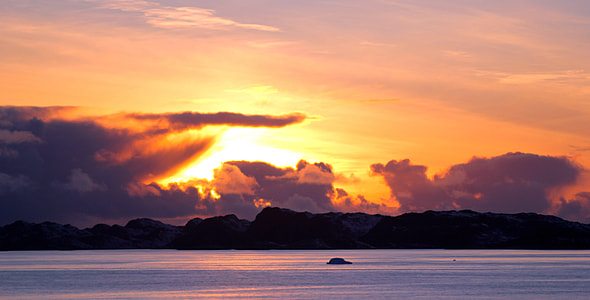 Sunset Beyond the clouds in Greenland thumbnail