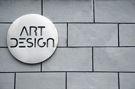 Art Design signage on wall at daytime thumbnail