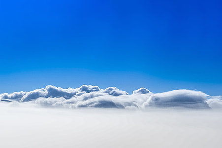 This shot of a cloud formation was captured through a plane window while flying thumbnail