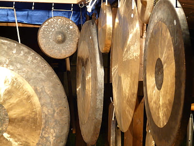 several assorted-sizes gongs thumbnail