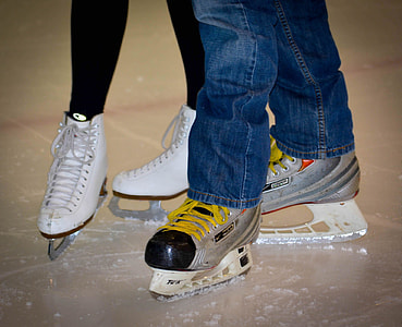 two person wearing figure skates thumbnail