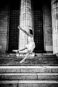 Grayscale Photo Of Woman Dancing On Stairs thumbnail