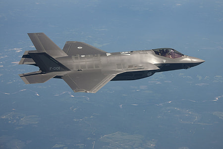 selective focus photography of gray fighter jet thumbnail