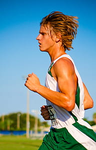 man running near open field thumbnail