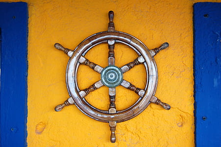 brown wooden ship's helm thumbnail