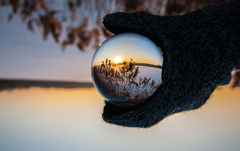 closeup photo of ball with reflection of grass thumbnail