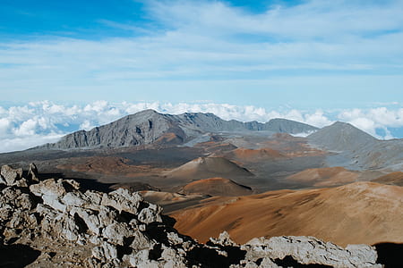 brown and gray mountains during day time thumbnail