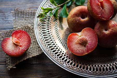 sliced fruit served on plate thumbnail