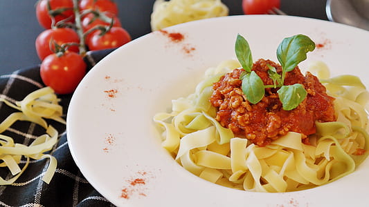 serve plate of cooked pasta with sauce thumbnail